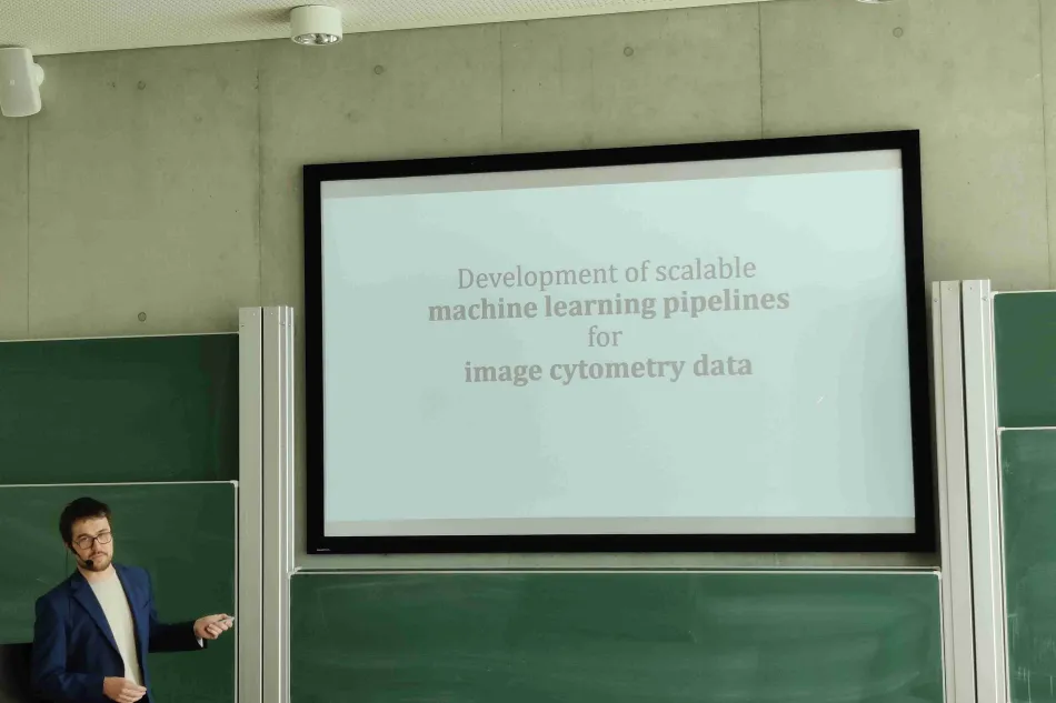 Maxim defending his PhD